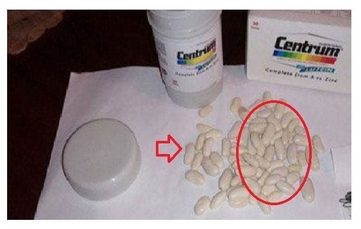 فاصوليا بيضاء داخل علبة دواء فيتامينات