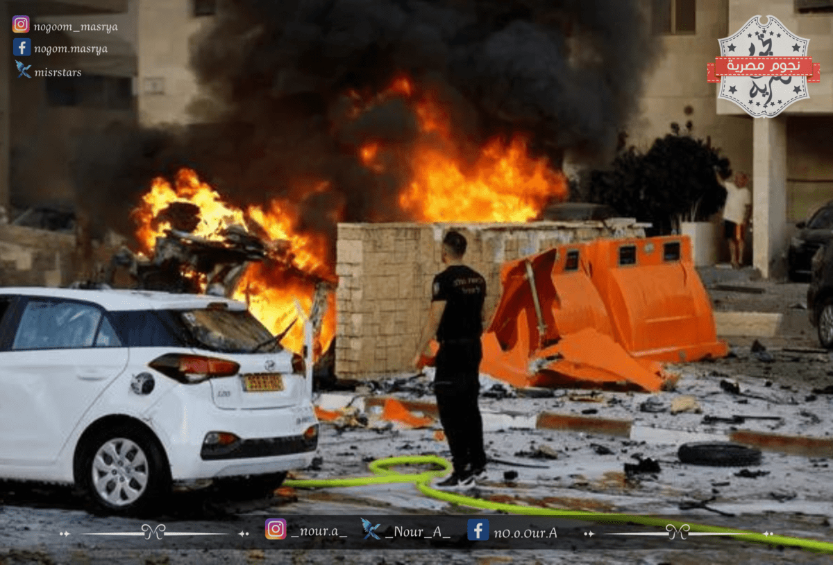 اندلاع النيران بعد سقوط صواريخ من قطاع غزة على مدينة عسقلان صباح يوم السبت 7 أكتوبر 2023 - مصدر الصورة: موقع Haaretz